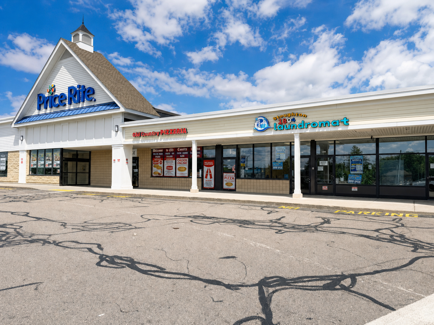 Stoughton 1804 Laundromat beside Price Rite Market with parking in front